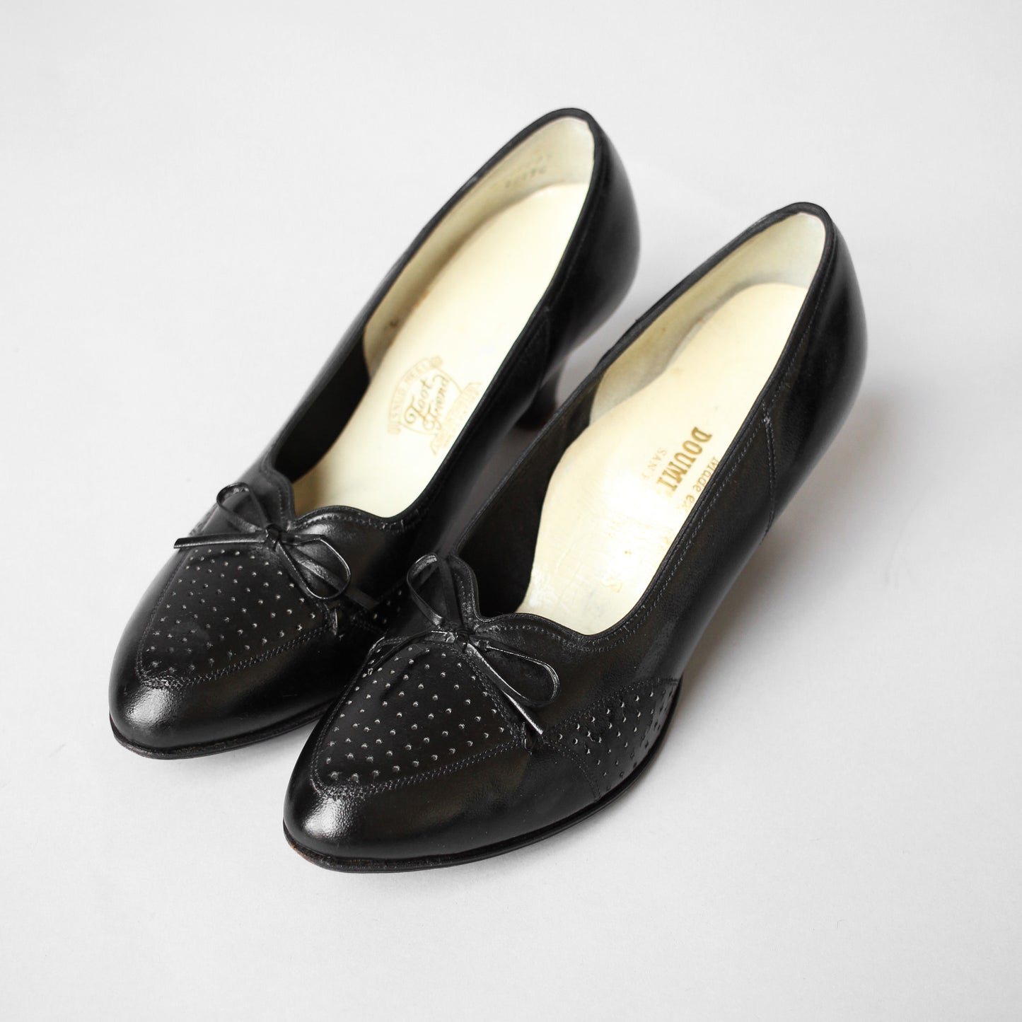 Black 1930s Perforated Heeled Flats with Bow